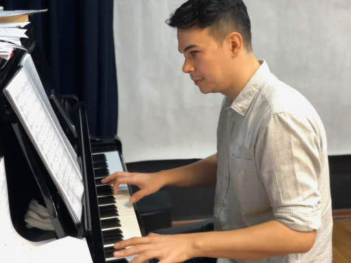 Dominic playing the piano